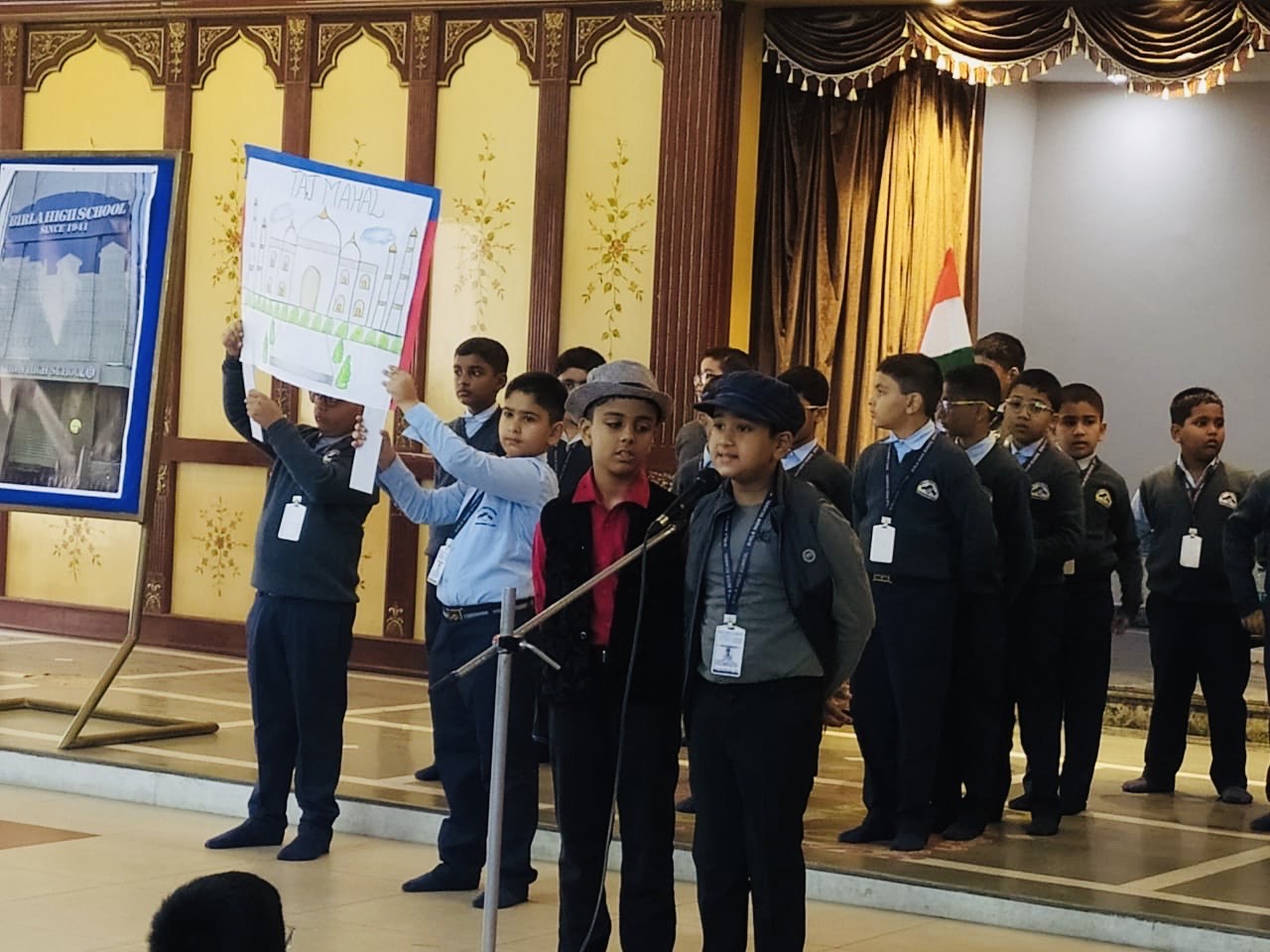 STUDENTS DISPLAYING PLACARDS
